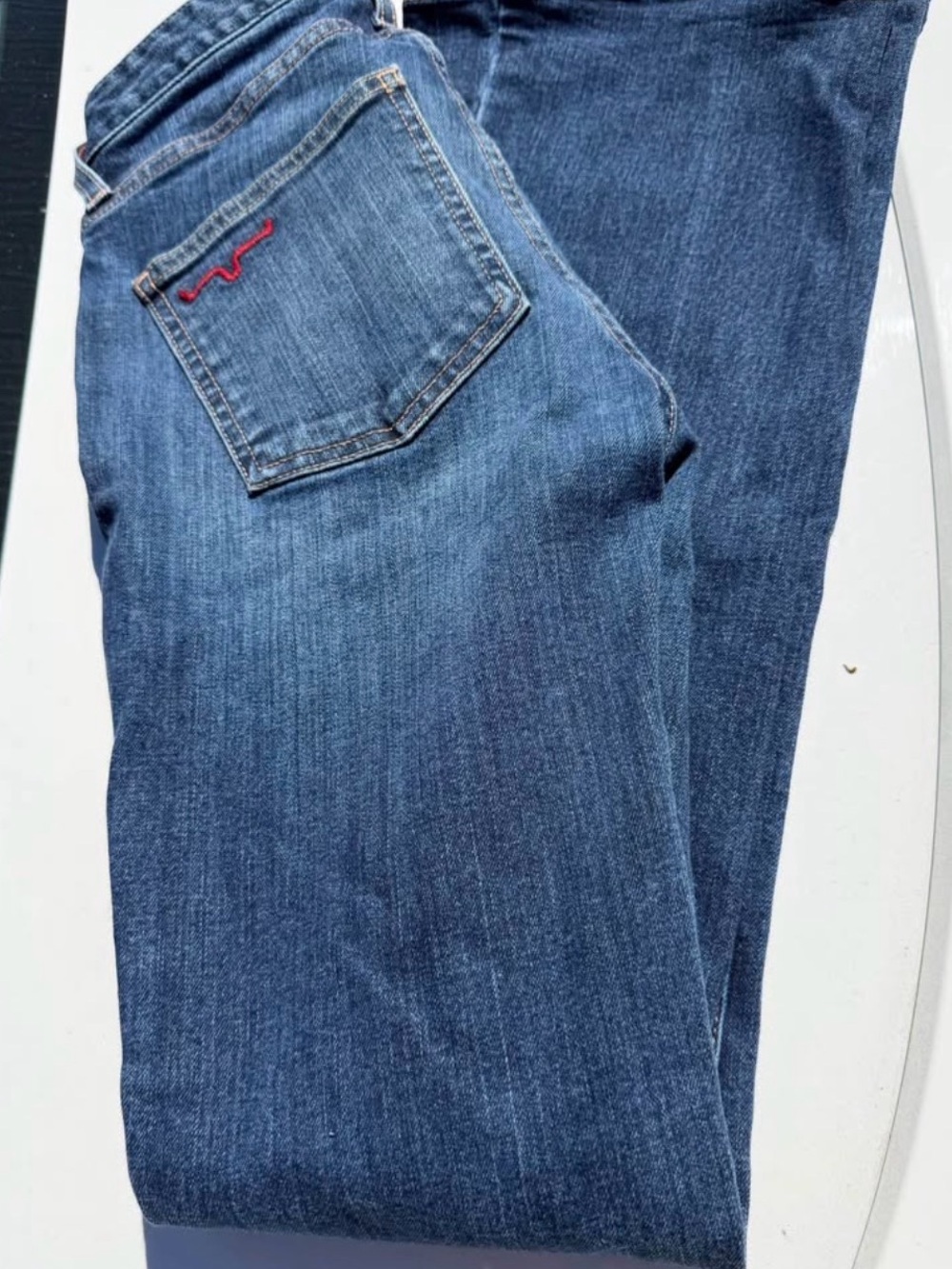 Kimes Ranch Women's Blue Flare Jeans with Red Pocket Accent